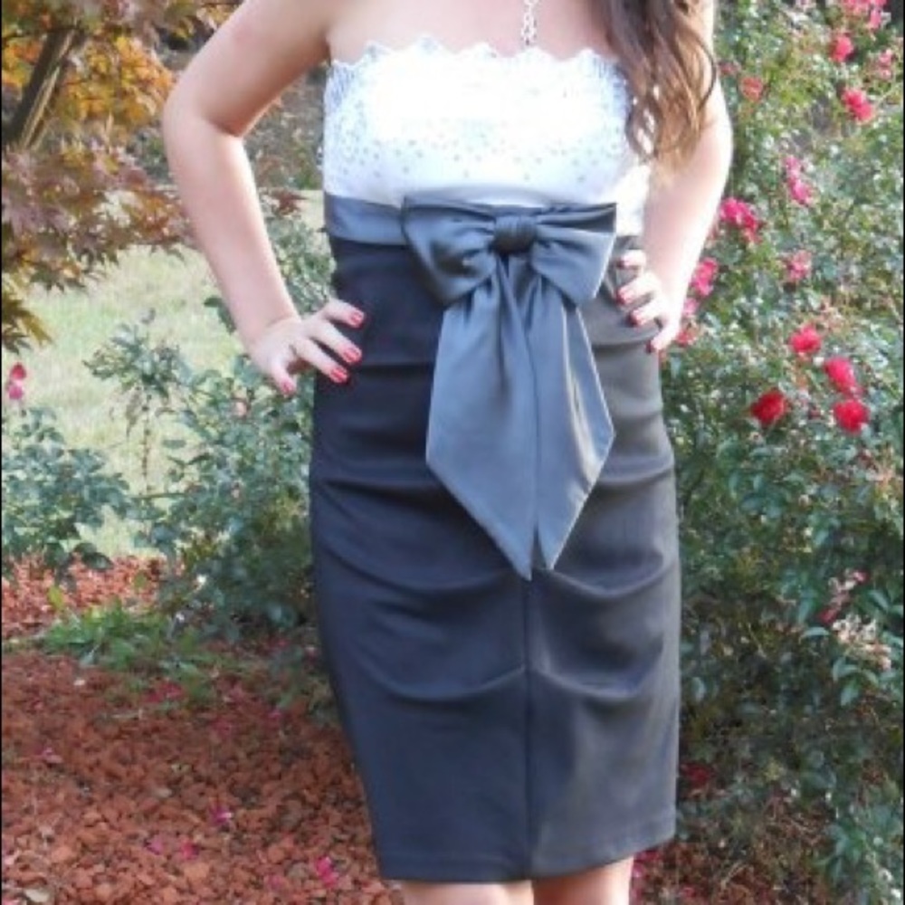 Short black and white fancy dress.